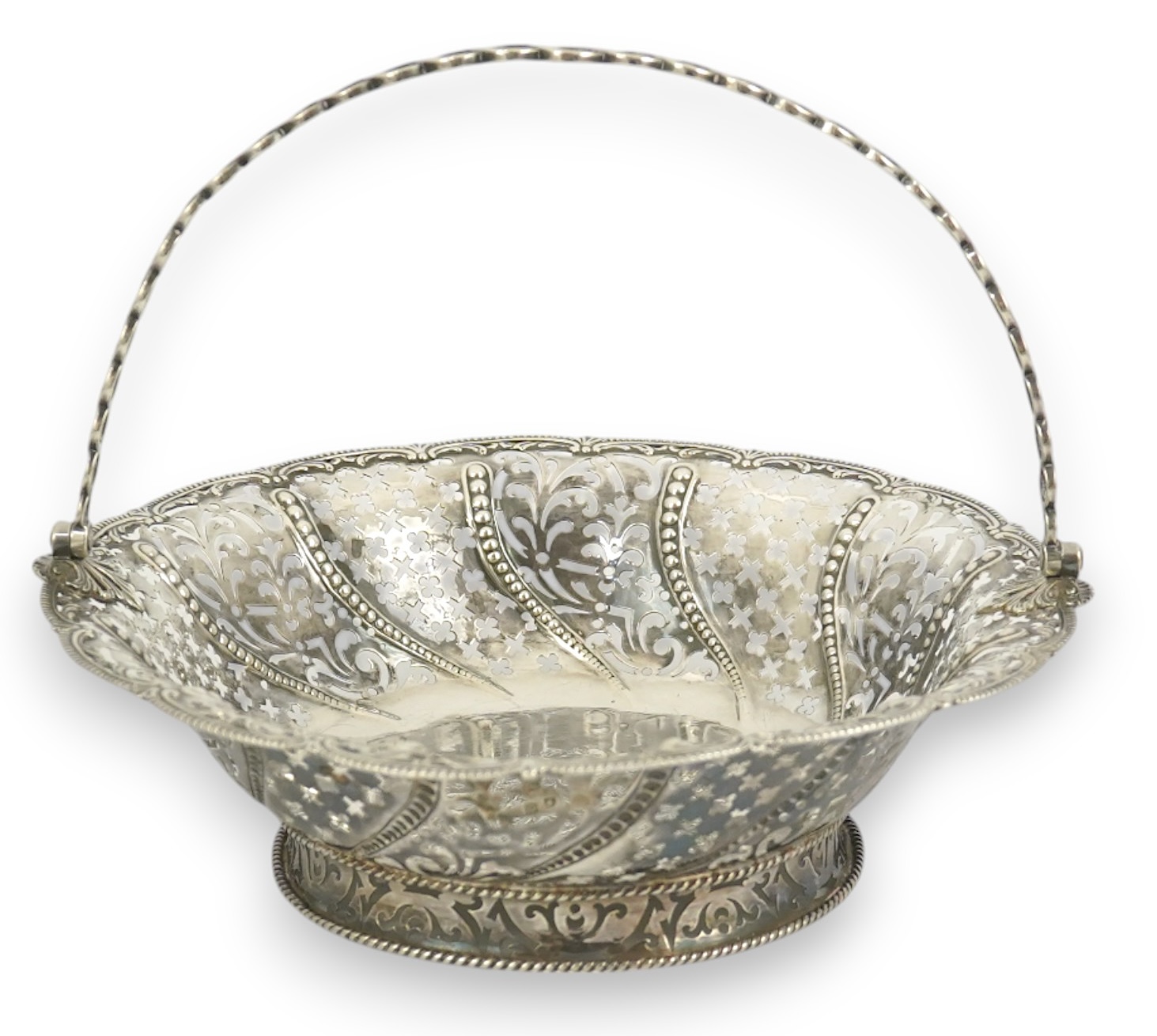 A late George II pierced silver cake basket, by William Plummer?